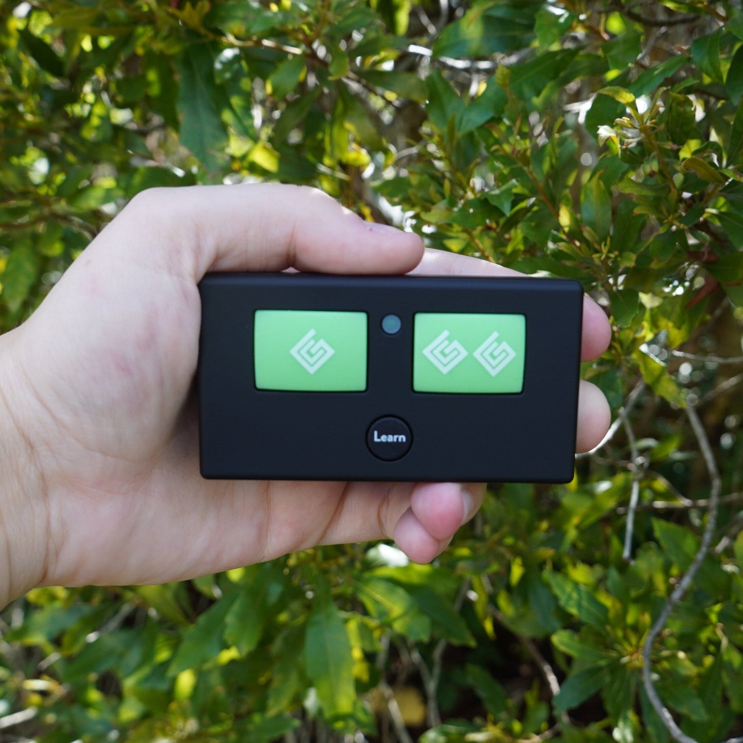 Ghost Controls Water Resistant Long Distance 3-Button Gate Opener Transmitter with 1000 ft Range and Mounting Bracket