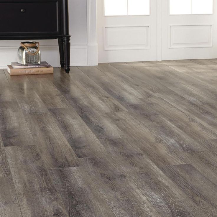 TrafficMaster Alverstone Oak 8 mm Thick x 6-1/8 in. Wide x 47-5/8 in. Length Laminate Flooring (20.32 sq. ft. / case)