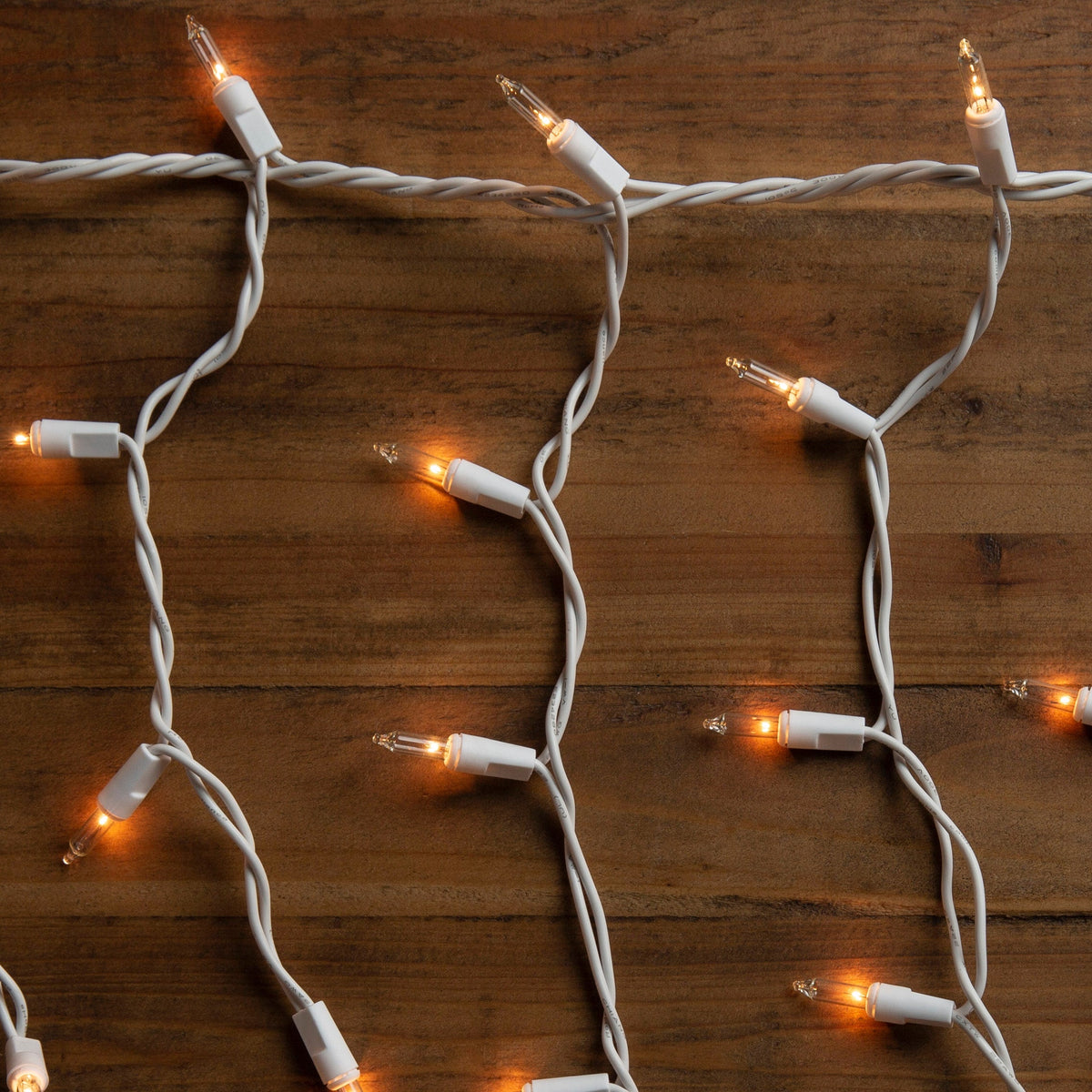 GE String-A-Long 300-Count Constant White Mini Incandescent Plug-In Christmas Icicle Lights