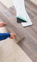 Style Selections Driftwood 6-in W x 36-in L x 2-mm Peel-and-Stick Vinyl Plank Flooring, 3-mil Wear Layer (1.5-sq ft Piece)