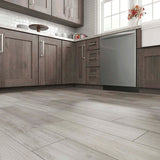 Style Selections Woods Vintage Gray 6-in x 24-in Porcelain Wood Look Floor Tile (Common: 6-in x 24-in; Actual: 5.84-in x 23.5-in)
