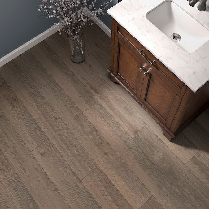 Quick-Step Studio QuickStep Studio + Spill Repel Whistler Oak 12-mm T x 6-in W x 48-in L Waterproof Wood Plank Laminate Flooring (16.12-sq ft / Carton)