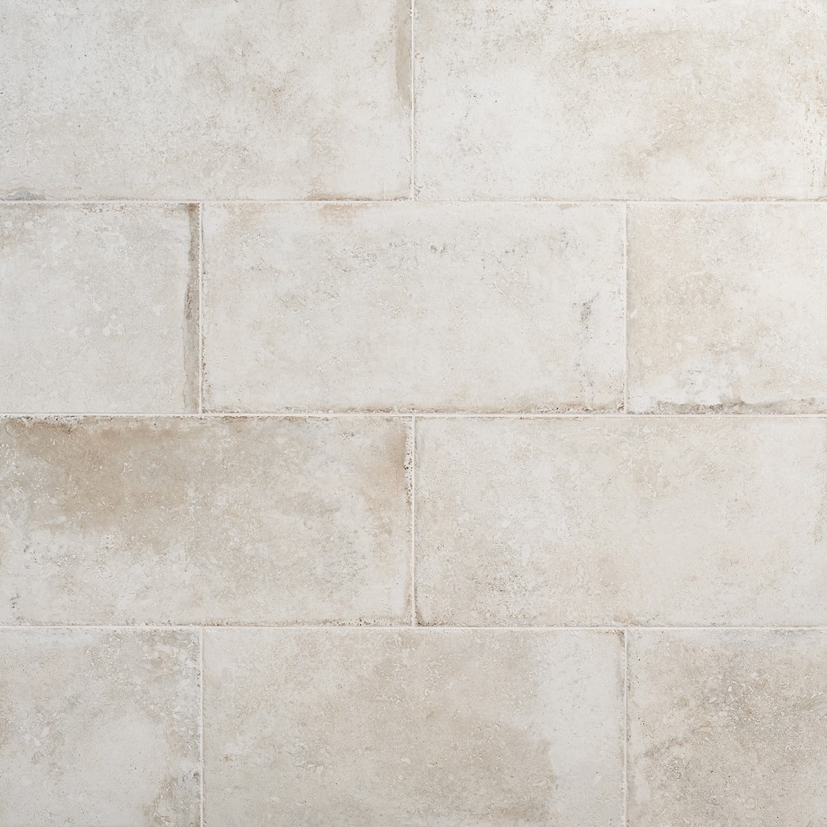 Seville Olimpia White 12x24 Matte Porcelain Tile - Travertine Look