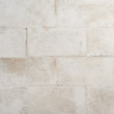 Seville Olimpia White 12x24 Matte Porcelain Tile - Travertine Look