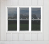 Pella 150 Series New Construction 31-1/2-in x 53-1/2-in White Vinyl Low-E Argon Double-Hung Window with Grids, Full Screen Included