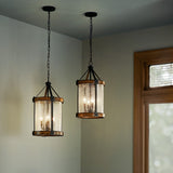 Kichler Barrington 4-Light Distressed Black and Wood Tone Rustic Seeded Glass Cylinder Medium Hanging Pendant Light