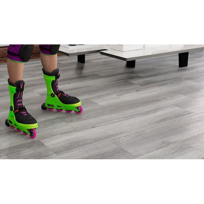 STAINMASTER PetProtect Pheasant Lane Oak 12-mm T x 7-1/2-in W x 50-in L Waterproof Wood Plank Laminate Flooring (23.69-sq ft / Carton)