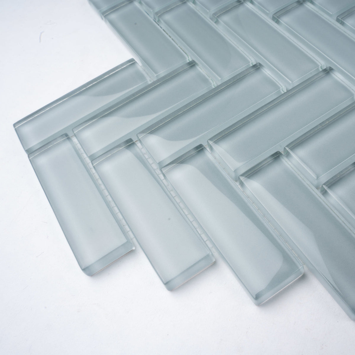 Apollo Tile (Sample) Colorway Light Gray 4-in x 4-in Glossy Glass Herringbone Floor and Wall Tile