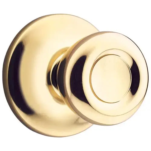 Kwikset Tylo Polished Brass Passage Lockset, ANSI/BHMA Grade 3, 1-3/4 in Door Thickness