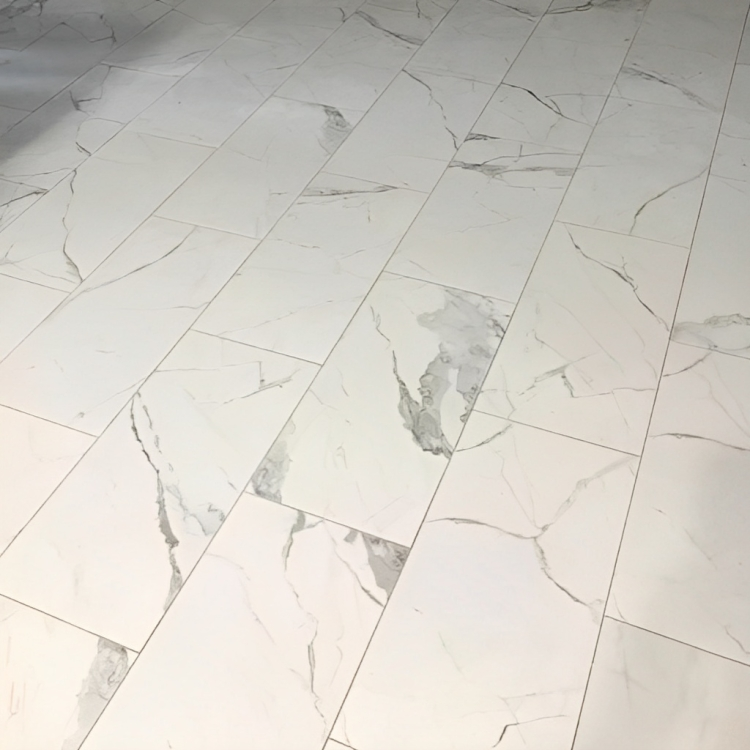 Statuario 12-in x 24-in Polished Porcelain Marble Look Floor and Wall Tile (1.93-sq. ft/ Piece)