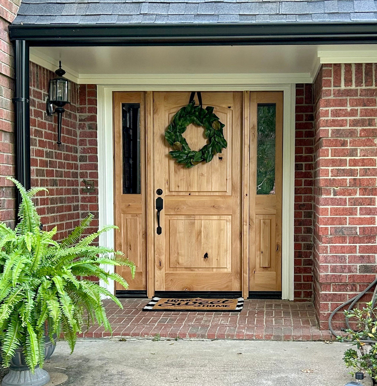 Krosswood Doors 36 in. x 80 in. Rustic Knotty Alder 2-Panel Top Rail Arch Solid Wood Core Stainable Right-Hand Prehung Exterior Door