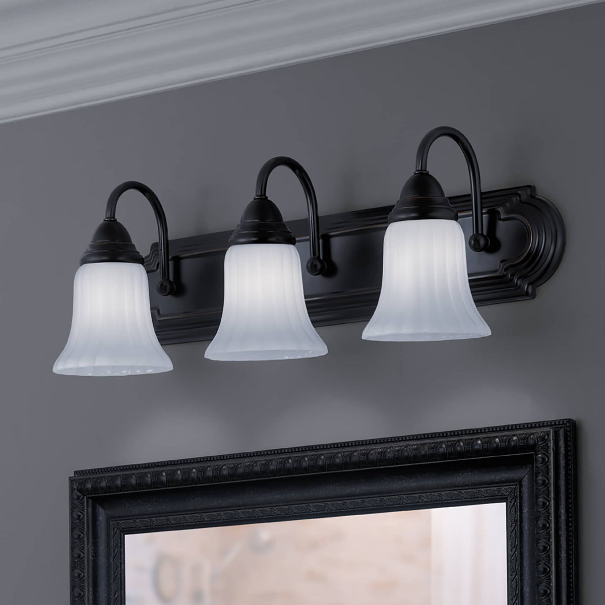 Portfolio Shaker Park 3-Light 24.09-in Oil-Rubbed Bronze Vanity Light with White Glass Shades