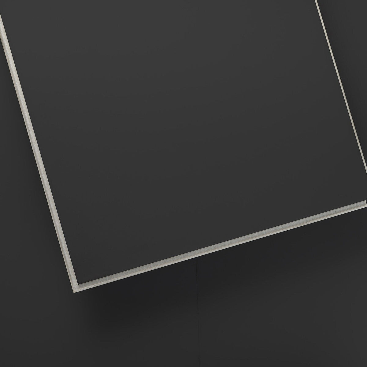 Lucida USA (Sample) MonoCore Licorice Black Solid 22-mil Interlocking Luxury Vinyl Plank