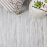 Lucida USA BaseCore Winter Gray 12-mil x 6-in W x 36-in L Waterproof Peel and Stick Vinyl Plank Flooring (54-sq ft/ Carton)