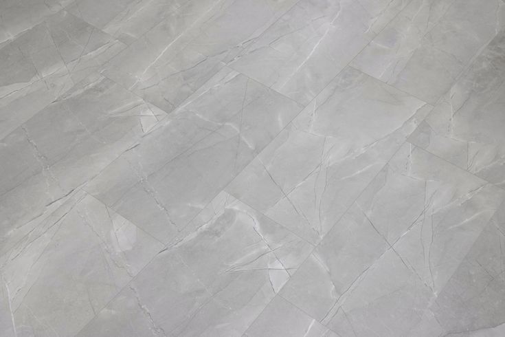 CALI Shorebreak Tiburon Marble 12-mm T x 11-13/16-in W x 23-5/8-in L Waterproof Tile Look Laminate Flooring (15.5-sq ft / Carton)