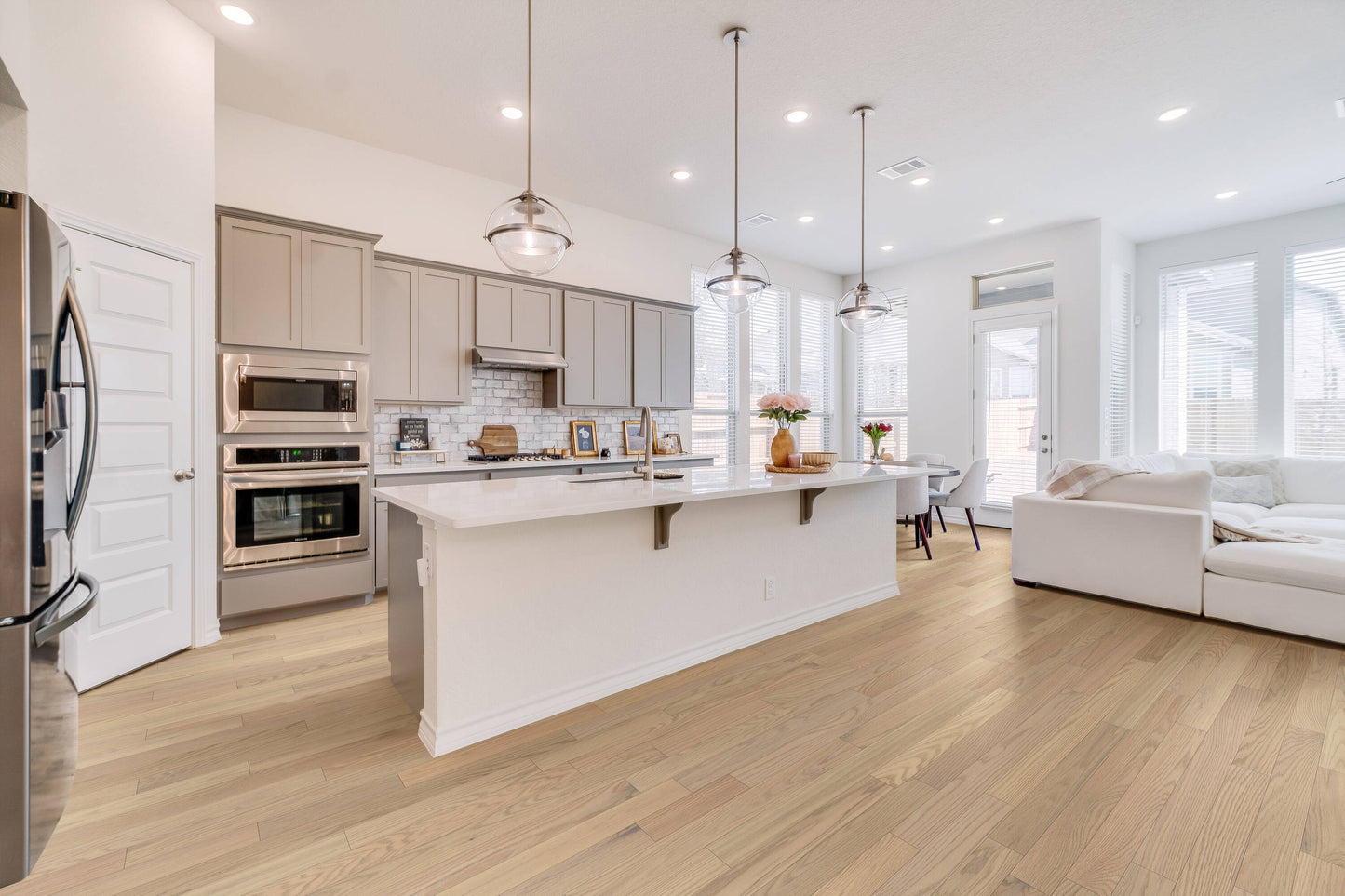 Green Leaf Oak Polar White hardwood flooring — installed room view