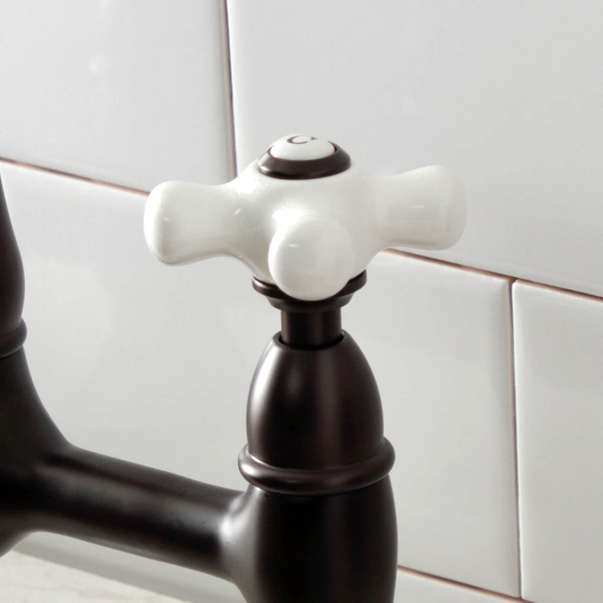 Elements of Design Oil-Rubbed Bronze 2-Handle Deck-Mount Bridge Kitchen Faucet with Porcelain Cross Handles