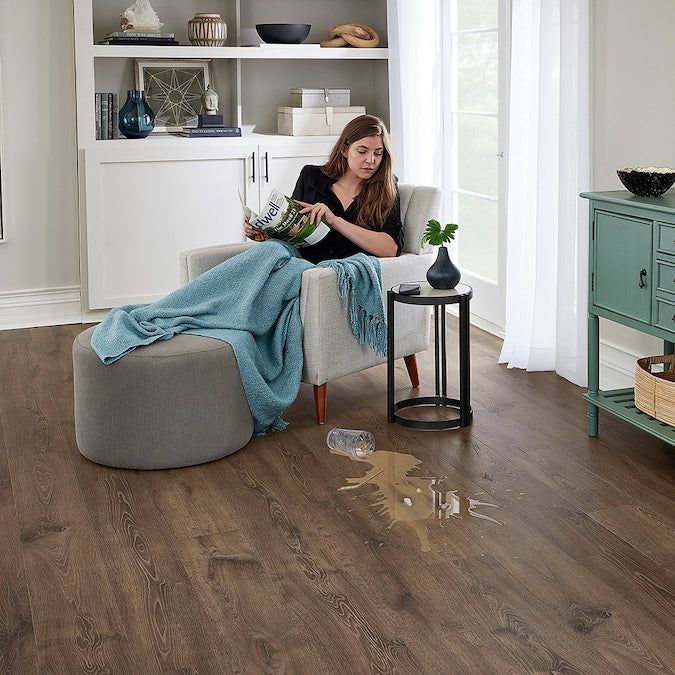 STAINMASTER PetProtect Stockette Oak 12-mm T x 7-1/2-in W x 47-1/4-in L Waterproof Wood Plank Laminate Flooring (22.09-sq ft / Carton)