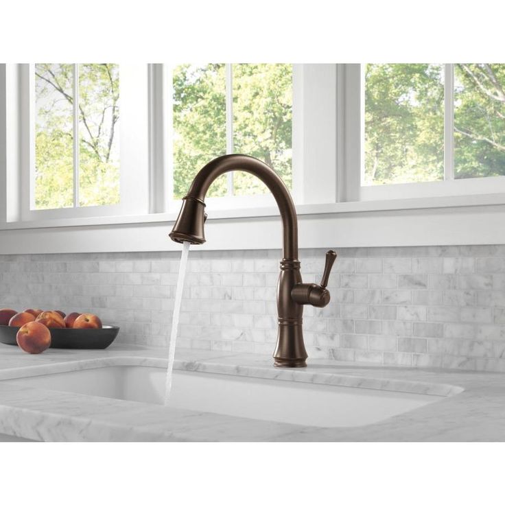Delta Cassidy Venetian Bronze 1-Handle Deck-Mount Pull-Down Handle Kitchen Faucet