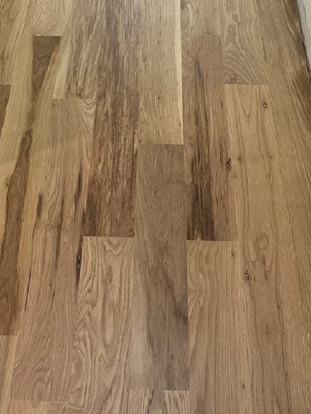 Bridgewell Resources White oak Unfinished hardwood flooring — primary plank view