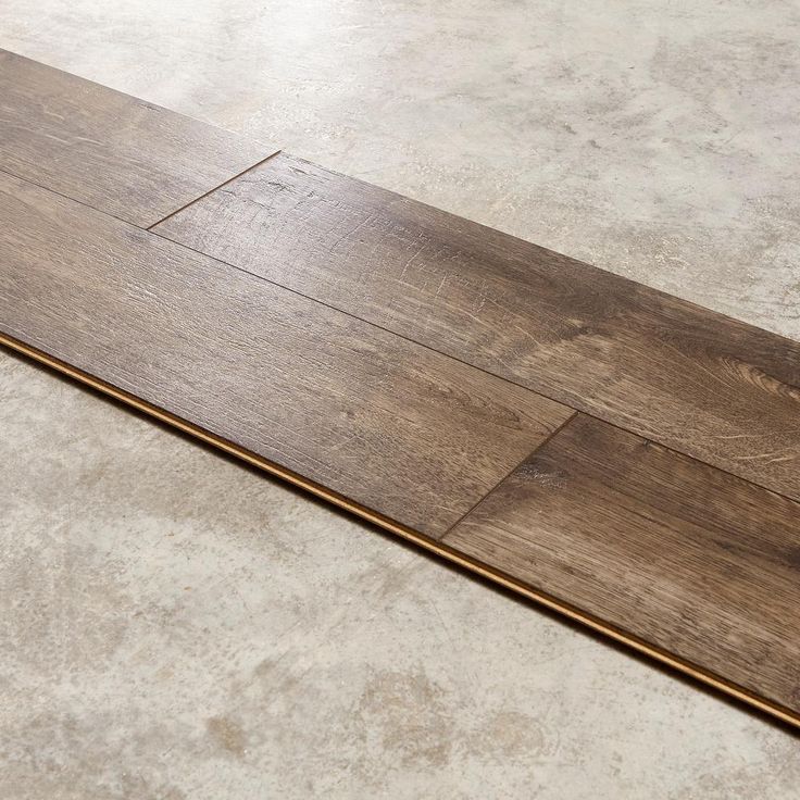 Fincrest Brown Oak 12 mm Thick x 6-1/16 in. Wide x 50-2/3 in. Length Laminate Flooring (682.8 sq. ft. / pallet)