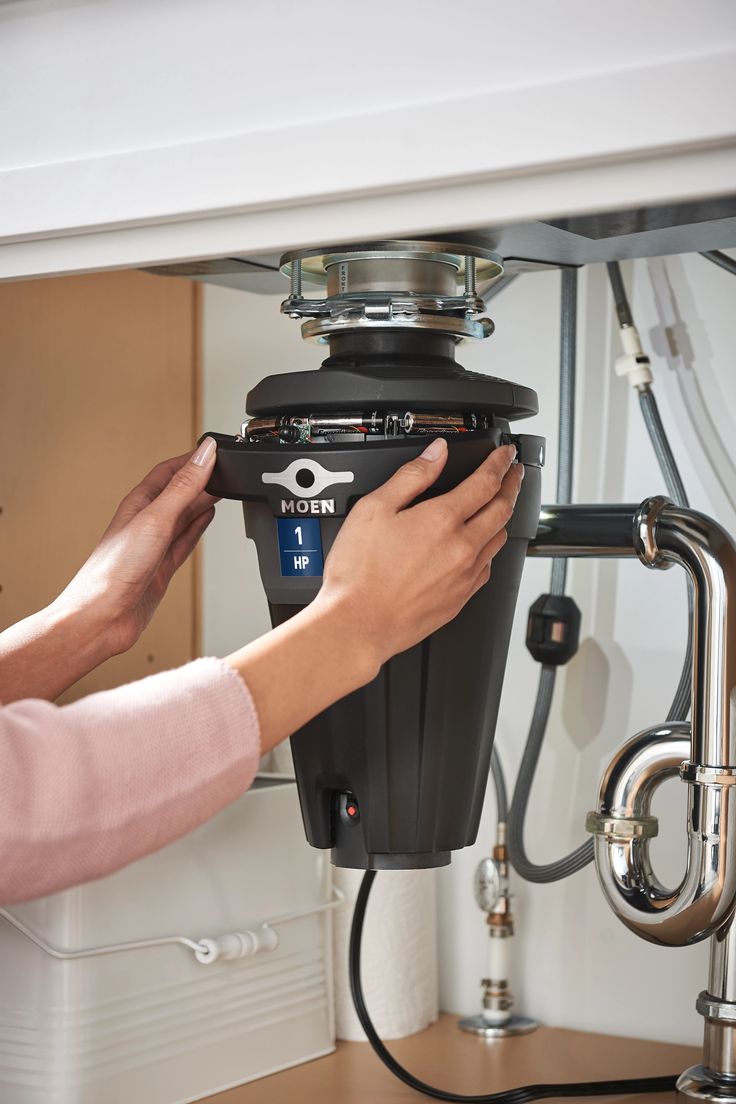 MOEN Chef Series 1-HP Continuous Feed Garbage Disposal with Integrated Lighting and Sound Reduction