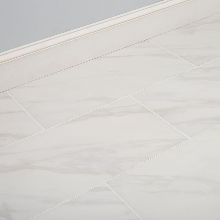 Bianco Carrara 12-in x 24-in Glazed Ceramic Marble Look Floor and Wall Tile (1.92-sq. ft/ Piece)