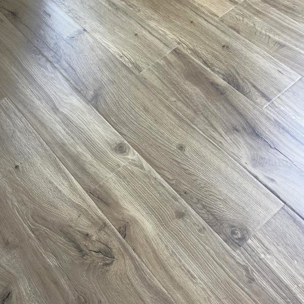 Outlast+ Golden Rustic Oak 12 mm T x 6.1 in. W Waterproof Laminate Wood Flooring (16.1 sqft/case)