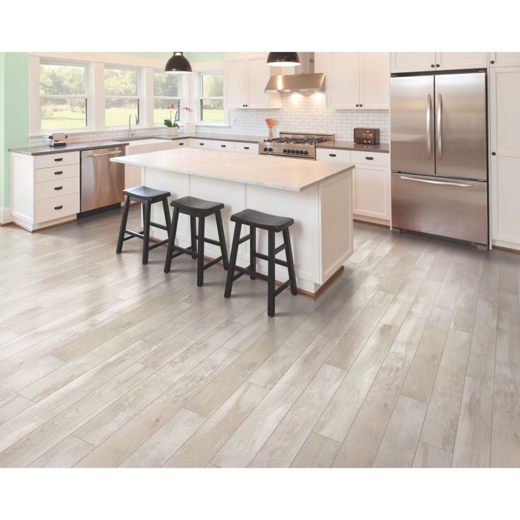 Style Selections Seaside Chestnut 6.14-in W x 3.93-ft L Embossed Wood Plank Laminate Flooring
