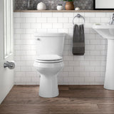 Cimarron Comfort Height 2-Piece 1.28 GPF Single Flush Round Toilet with AquaPiston Flush Technology in White - Super Arbor