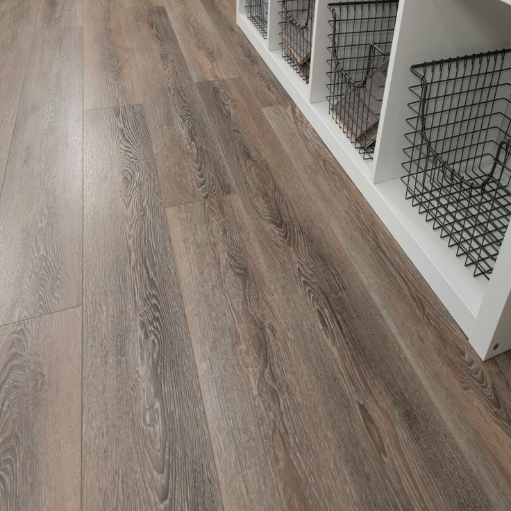 CALI Mute step Dockwood Oak Brown 20-mil x 7-in W x 48-in L Waterproof Interlocking Luxury Vinyl Plank Flooring (24.03-sq ft/ Carton)