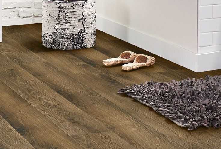 Armstrong Flooring Assurity Light Mocha 20-mil x 7-in W x 60-in L Waterproof Interlocking Luxury Vinyl Plank Flooring