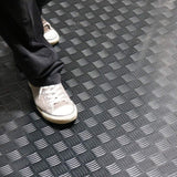 Rubber-Cal "Diamond-Grip" 4 ft. x 40 ft. Black Commercial PVC Flooring