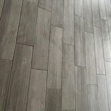 Style Selections Woods Natural 6-in x 24-in Glazed Porcelain Wood Look Floor Tile - Super Arbor