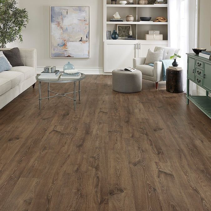 STAINMASTER PetProtect Stockette Oak 12-mm T x 7-1/2-in W x 47-1/4-in L Waterproof Wood Plank Laminate Flooring (22.09-sq ft / Carton)