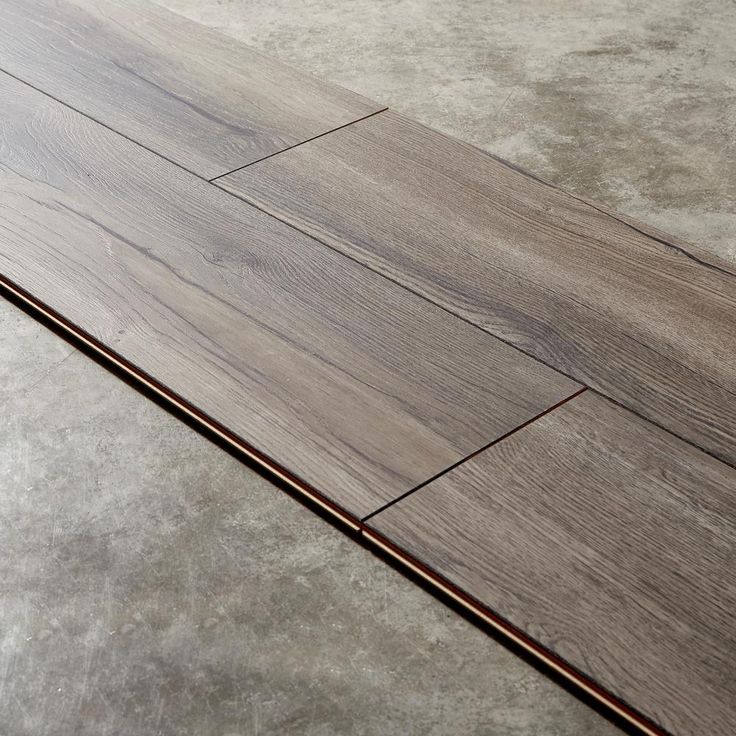 Home Decorators Collection EIR Waveford Gray Oak 12 mm Thick x 7-1/2 in. Wide x 50-2/3 in. Length Laminate Flooring (18.42 sq. ft. / case)