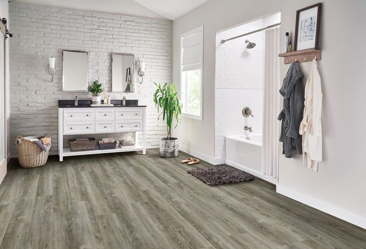 Armstrong Flooring Assurity Light Gray 20-mil x 7-in W x 60-in L Waterproof Interlocking Luxury Vinyl Plank Flooring