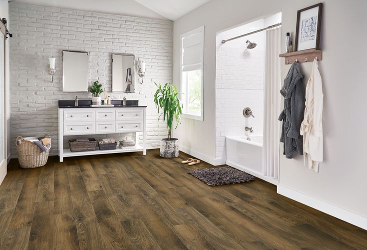 Armstrong Flooring Assurity Light Mocha 20-mil x 7-in W x 60-in L Waterproof Interlocking Luxury Vinyl Plank Flooring
