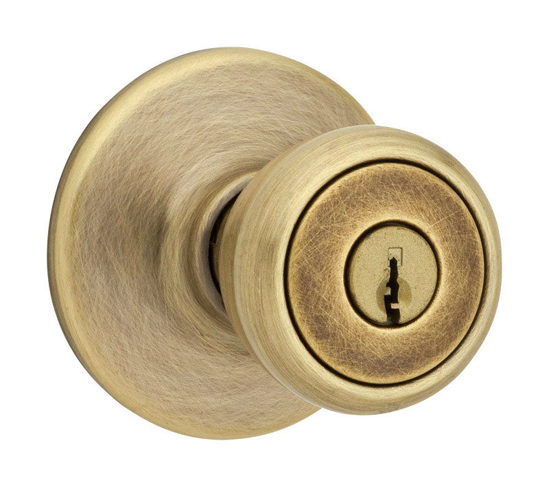 Kwikset Tylo Antique Brass Entry Knob, ANSI/BHMA Grade 3, Fits Doors to 1-3/4 in.