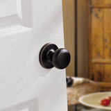 Kwikset Cove Venetian Bronze Passage Hall/Closet Door Knob