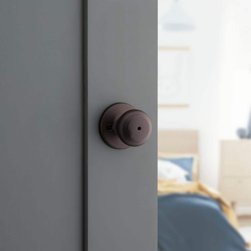 Kwikset Cove Venetian Bronze Privacy Bed/Bath Door Knob