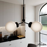 Hunter Hepburn 4-Light Matte Black Branch Chandelier with Cased White Shades