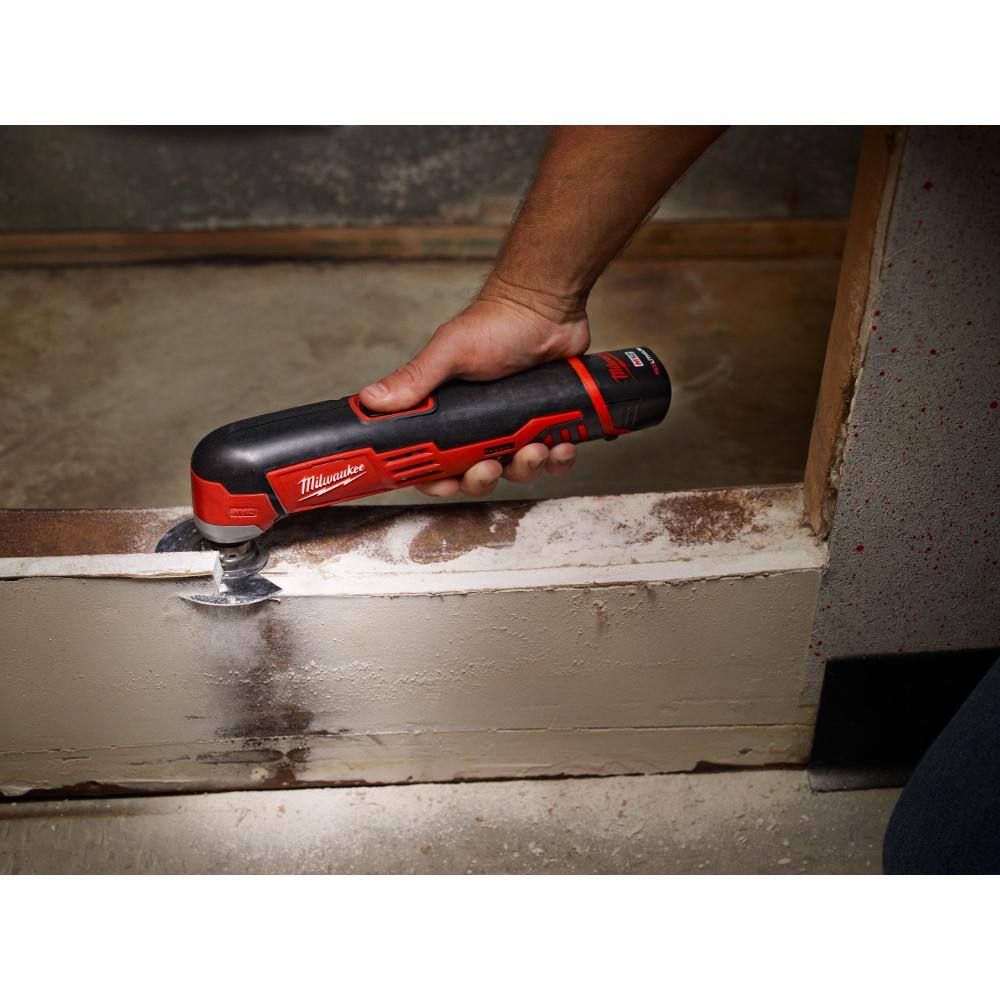 Milwaukee M12 12V Lithium-Ion Cordless Oscillating Multi-Tool with M12 10 oz. Caulk and Adhesive Gun and 6.0Ah XC Battery Pack