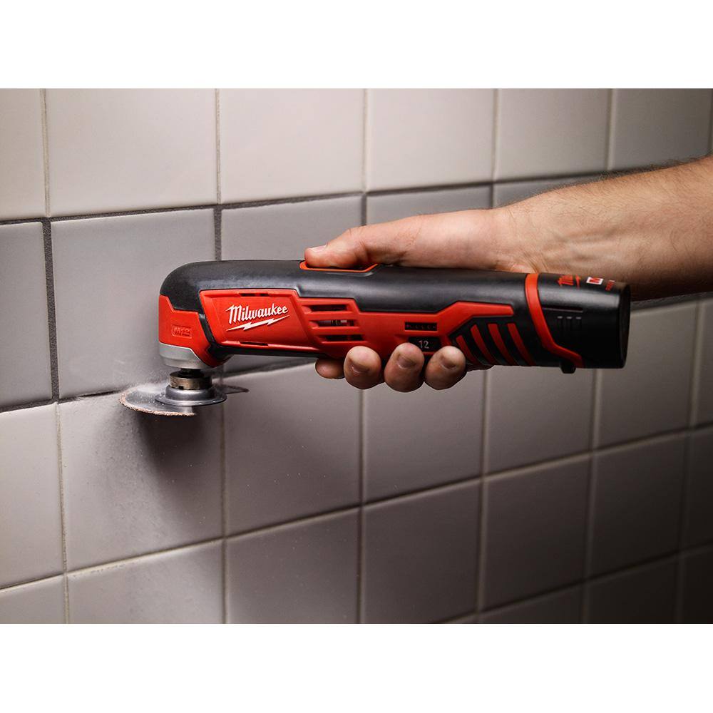 Milwaukee M12 12V Lithium-Ion Cordless Oscillating Multi-Tool with M12 10 oz. Caulk and Adhesive Gun and 6.0Ah XC Battery Pack
