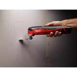 Milwaukee M12 12V Lithium-Ion Cordless Oscillating Multi-Tool with M12 10 oz. Caulk and Adhesive Gun and 6.0Ah XC Battery Pack