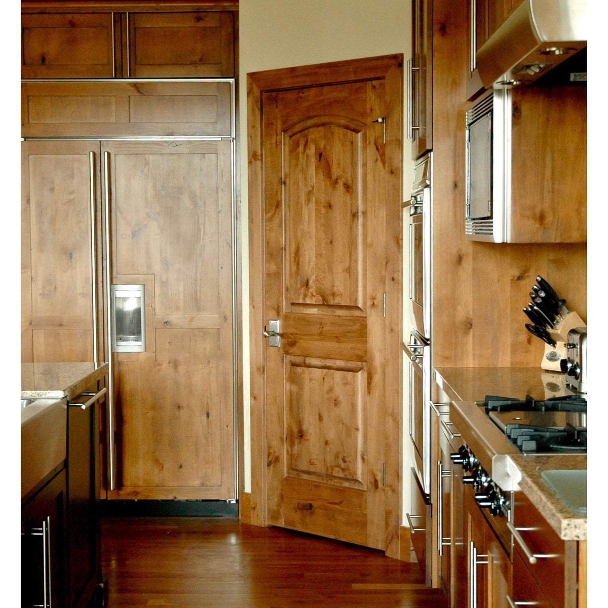 Krosswood Doors 30 in. x 80 in. Knotty Alder 2-Panel Top Rail Arch with V-Groove Solid Wood Core Interior Door Slab
