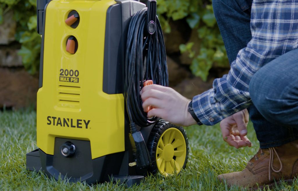 Stanley 2,000 PSI 1.4 GPM Electric Pressure Washer with 30 ft Working Hose Reel, Detergent Tank, Spray Gun, 4 Nozzles